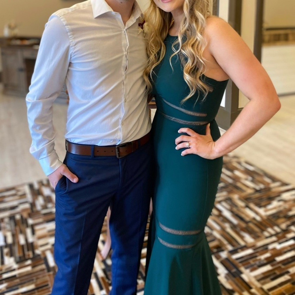 Emerald green dress with cutouts